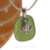 Well Aged Seaweed Green sea glass set on a Solid Sterling cast bail with a Sterling Silver Sea Turtle charm.
The sea glass necklace comes on our 18" solid sterling smooth snake chain (SHOWN and included)