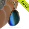 A SUPER ULTRA RARE mixed vivid blues and greens this English sea glass piece  set in our Original Wire Bezel© necklace pendant setting in 14K Rolled Gold.
SOLD - Sorry this Rare Sea Glass Pendant is NO LONGER AVAILABLE!