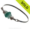 Seafoam Green Sea Glass pieces and a large Aqua recycled glass bead on this Solid Sterling Silver Half Round Bangle Bracelet with LARGE real Cultured Freshwater Pearls.
SOLD - Sorry this Sea Glass Bangle Bracelet is NO LONGER AVAILABLE!