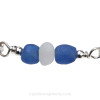 A detail of this Sea Glass Bracelet shows you the perfect White Sea Glass Center Bead and the recycled beads at color of the clear blue sky.