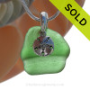 VIVID Genuine Ridged Green Sea Glass Necklace with Beach found sea glass and solid sterling details and Solid Sterling Silver Snake chain.
SOLD - Sorry this Sea Glass Necklace is NO LONGER AVAILABLE!
