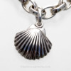 A detail of the Scallop Charm