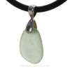 A Prefect piece of Sea Green sea glass from set  on a Sterling bail with Black Neoprene Cord