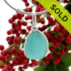 This is a beautiful Aqua Blue Sea Glass set in our Original Wire Bezel© pendant setting in Sterling Silver . Nice flatter piece with an extra large bail.
SOLD - Sorry this Rare Sea Glass Pendant is NO LONGER AVAILABLE!