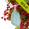 Vivid Bright Aqua Blue Genuine Sea Glass Pendant in our Original Wire Bezel© in Sterling Silver.
SOLD - Sorry this Rare Sea Glass Pendant is NO LONGER AVAILABLE!