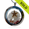 Genuine sea glass in a flashed red and a real starfish and sandollar of sea glass locket necklace. Genuine Garnet gems make this a great gift for any January Beach Baby!