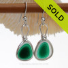 Two stunning vibrant green sea glass that originated as scrap art glass set in our Sterling Silver Original Wire Bezel© setting that leaves the sea glass UNALTERED from the way it was found on the beach.
