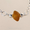 A detail of this solid sterling silver Sea Glass Necklace