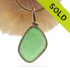 A thinner piece of green Genuine Sea Glass set in our Original Wire Bezel© setting in 14K Rolled Gold.
SOLD - Sorry this Sea Glass Jewelry selection is NO LONGER AVAILABLE!