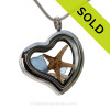 A Beautiful piece of Carolina Blue combined with a real Starfish and Fresh Water Pearls  in this Genuine Sea Glass Heart Locket Necklace.