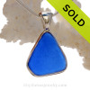 A lovely triangle of Cobalt Blue Sea Glass In a Solid Sterling Silver Wire Bezel© Necklace Pendant.
A lovely piece of lucky blue sea glass in a classic setting of sterling silver.