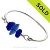 Lucky Cobalt and Medium Blue Sea Glass combined Solid Sterling Beads on this Solid Sterling Silver Premium Sea Glass Bangle Bracelet.