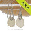 Beautiful light yellow depression era sea glass on solid sterling silver deco earwires.