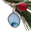 Originating as end of day art glass tossed into the sea. Glass from this region tends to be the best in the world. Most likely the remnants of a broken attempt of a vintage Hartley and Wood vase Circa 1900, the historical source of this amazing sea glass pendant piece. Color is NOT APPLIED but was fused into the glass over 100 years ago.