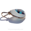 A side view shows you the thickness of the sea glass in the pendant and the quality of the bezel work.