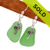 Sorry these green sea glass earring with silver palm tree charms have been sold!