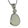 In no direct light the pendant appears a translucent  yellowish white .