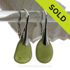 Natural Olive or Peridot green sea glass pieces really on solid sterling silver leverbacks. 