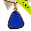 Blue Sea Glass Pendant In Gold Wire Bezel© 