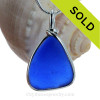 A Perfect Triangle piece of Cobalt Blue Genuine Sea Glass with in our signature Original Wire Bezel© pendant setting in Sterling Silver.