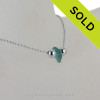 A lovely single sea glass drop in aqua green and finished with all solid sterling silver.