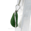 A side view shows you the thickness of the sea glass piece and the quality of the sterling silver bezel.