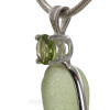 A genuine brilliant cut peridot 4MM gem is set in a4 prong setting.