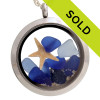 Light and dark cobalt blue sea glass locket with starfish. Just like the beach the contents change.
Sorry this locket is sold!