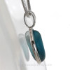 A side view shows you the thickness of the pendant and the quality of the bezel work.