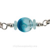 The center bead is handmade by a glass artist and resembles tropical sea.