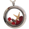 Front of red sea glass locket with starfish and shells. These personal beaches on the go, change like the tides.
This is the exact locket you will receive!