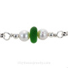 The center sea glass bead with pearls.
