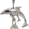 A detail of the dolphin pendant.