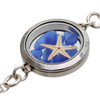 Detail of blue sea glass and starfish in locket
