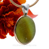Stunning mixed olive green Seaham Sea Glass set in a mixed gold and silver bezel pendant