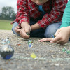 Children use to play marbles before cell phones and computers.