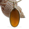 Genuine amber sea glass pendant