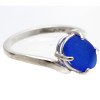 A vivid cobalt blue sea glass piece that is UNALTERED from the way it was found on the beach. Unlike most jewelers that cut a stone to fit a setting, we hunt through 1000's of pieces to find the perfect fit for our sea glass rings.
This is the EXACT sea glass ring you will receive!
