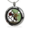 Green sea glass and a real sand dollar make this a great locket necklace for the holidays.