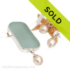 Stunning and perfect aqua sea glass is set in a fine sterling bezel and backed in sterling. This necklace comes WITH a solid sterling oval neck collar and matching earrings.
Sorry this one of a kind sea glass jewelry piece has been sold! 