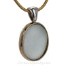 A very large Natural Sea Glass Pendant in a classic timeless setting.