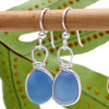 Bright blue English sea glass pieces set in a sterling bezel earring.
This is the EXACT pair you will receive!