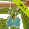 Vivid tropical aqua sea glass from Hawaii is set in our Original Wire Bezel© setting for a stunning pair of earrings.
Sorry this sea glass jewelry item has been sold!