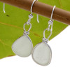 Perfect pure white sea glass from Puerto Rico set in our Original Wire Bezel© setting in sterling earrings.
This is the EXACT pair you will receive!