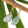 Perfect bright aqua green sea glass pieces set in our Original Wire Bezel© setting for a perfect pair of earrings. This sea glass is UNALTERED from the way it was found on the beach.
This is the EXACT pair or earrings you will receive!