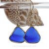 blue sea glass set in our Original Wire Bezel earring setting in gold
