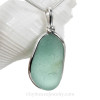 Aqua beach found sea glass from is set in our Original Wire Bezel© pendant 