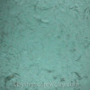 a macro detail of the sea glass in the one earring
