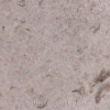 An extreme close-up revealing the telltale crescent shapes formed by decades of wave action, confirming this piece is real sea glass.