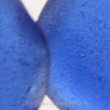 a close up of one of the earrings.